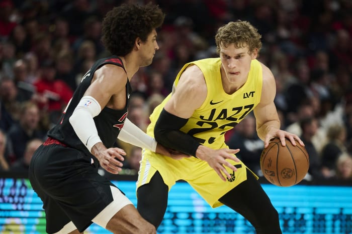 Utah Jazz forward Lauri Markkanen (23) dribbles the ball during the first half against Portland Trail Blazers guard Matisse Thybulle (4) at Moda Center.